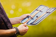 Paint brushes case in artist hands