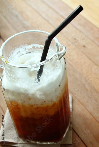 Photo: Cold coffee drink on table Cold coffee drink on table