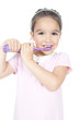 Little girl brushing her teeth