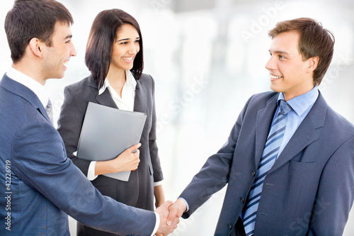 Photo: Business people shaking hands Business people shaking hands