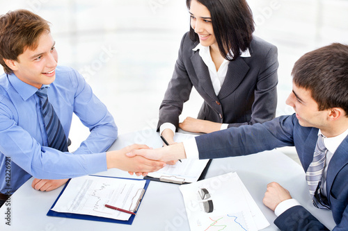 Photo: Business people shaking hands Business people shaking hands