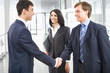 Photo: Business people shaking hands Business people shaking hands