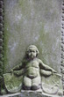 Foto: Engelsskulptur auf einem Grabstein Engelsskulptur auf einem Grabstein