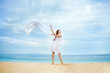 woman jumping with fabric