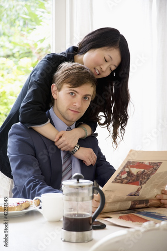 Photo: Young woman hugging man Young woman hugging man