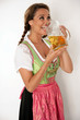 Photo: hübsche Frau im Dirndl mit Masskrug hübsche Frau im Dirndl mit Masskrug