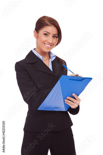 Foto: smiling business woman with blue clipboard smiling business woman with blue clipboard