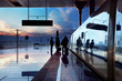 Foto: train stop at railway station with sunset train stop at railway station with sunset