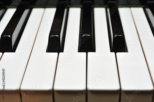 Photo: close-up of the piano keys close-up of the piano keys