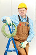Portrait of Electrician with wire equipment