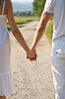 Couple holds hands