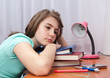 bored and tired student after hard work. Back to school concept 