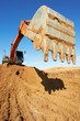 track-type loader excavator at work