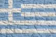 Greek Flag on Rock Wall