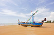 wooden fishing boat on the beach