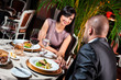 Foto: Beautiful couple in love at restaurant Beautiful couple in love at restaurant