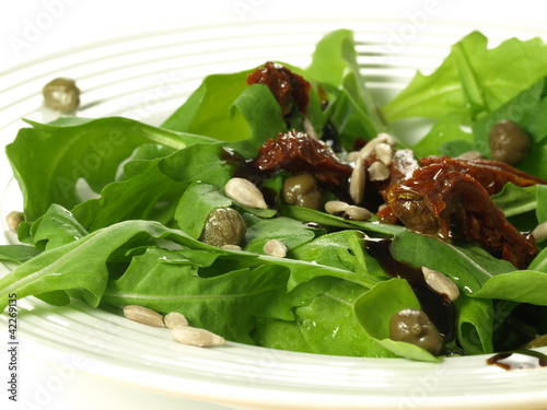 Photo: Arugula, tomatoes, capers: salad Arugula, tomatoes, capers: salad