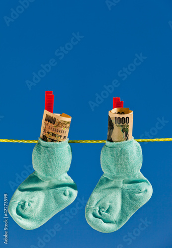 Foto: Baby Socken auf Wäscheleine mit Yen Baby Socken auf Wäscheleine mit Yen