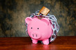 Photo: Chained piggybank Chained piggybank