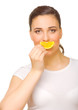 Young girl with slice of orange