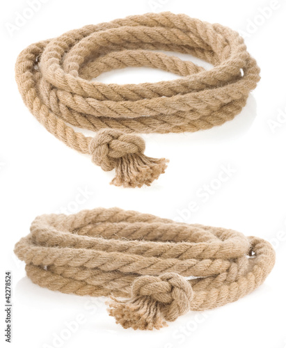 Photo: ship rope tied with knot isolated on white ship rope tied with knot isolated on white