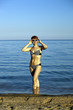 The harmonous woman on the seashore