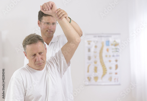Photo: Physiotherapy: Senior man and physiotherapist Physiotherapy: Senior man and physiotherapist