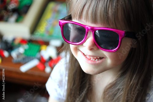 Photo: Portrait of beautiful young girl smiling Portrait of beautiful young girl smiling