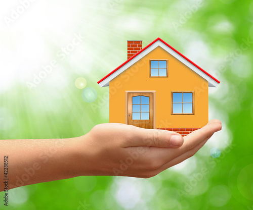 Photo: The house in hands The house in hands