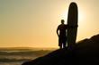 Foto: Long boarder watching the waves Long boarder watching the waves