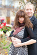 Dating couple with beautiful bright flowers