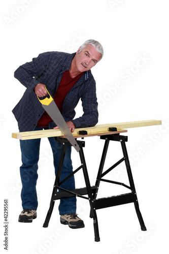 Photo: Carpenter at a workbench Carpenter at a workbench