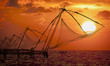 Photo: Sunset over Chinese Fishing nets in Cochin Sunset over Chinese Fishing nets in Cochin