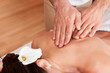 Beautiful young woman getting back massage