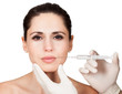 Beautician doing face injection to woman