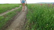Video: Young Woman Walking Down A Country Road Young Woman Walking Down A Country Road