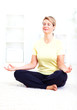 Senior woman doing yoga.