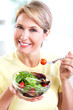 Senior woman with a salad. Diet.