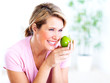 Senior woman with apple. Diet.