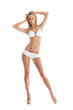A young Caucasian woman posing in a white swimsuit