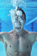 Drowning man underwater diver