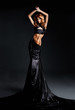 Fashion shoot of a beautiful woman in a long dress
