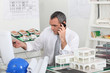 Architect on the phone in his office