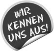 T-Sticker rund curl unten WIR KENNEN UNS AUS!