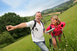 Retired people reading map on trekking day