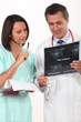 Doctor asking nurse for second opinion