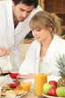 young couple having breakfast together
