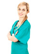smiling woman doctor in green uniform with folded arms