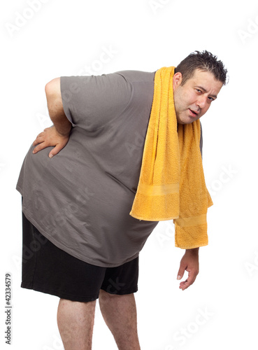 Photo: Fat man playing sport Fat man playing sport