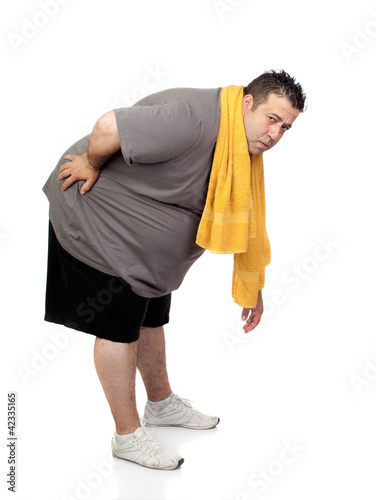 Photo: Fat man playing sport Fat man playing sport